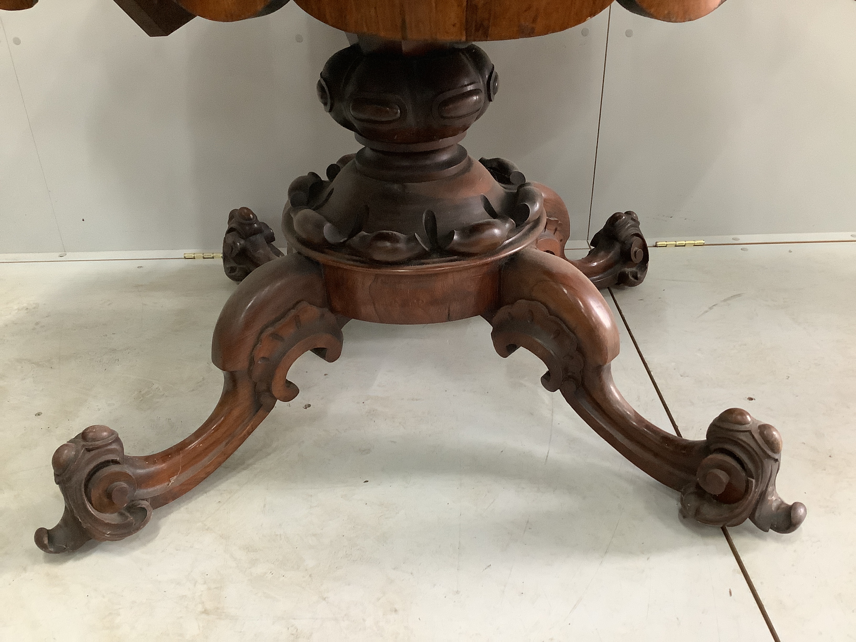 A mid Victorian rosewood centre table of shaped oval form, width 160cm, depth 108cm, height 76cm